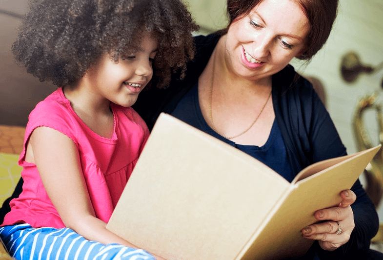 mom and daughter reading