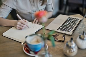 writing with laptop