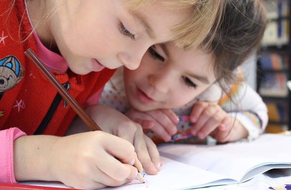 Kids writing on paper